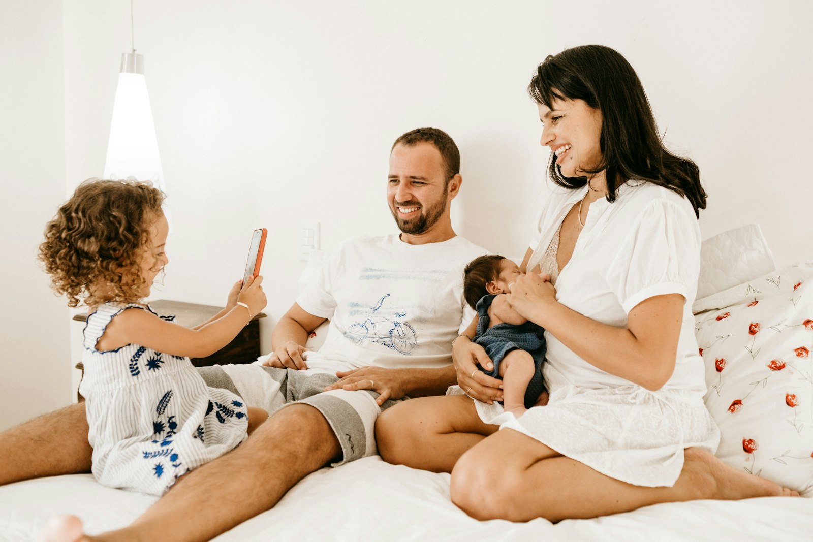 Parent and child smiling after a Portland lice treatment